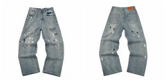 Gallery Dept Light‑Wash Text Print Ripped Jeans